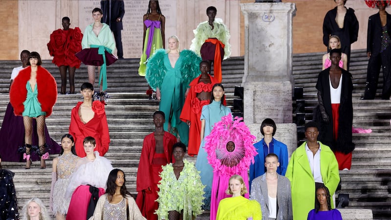 Models walk on the runway at the Valentino haute couture Autumn/Winter 2022 fashion show.